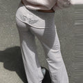 Women's Embroidered Flare Yoga Pants with Fold-Over Waistband